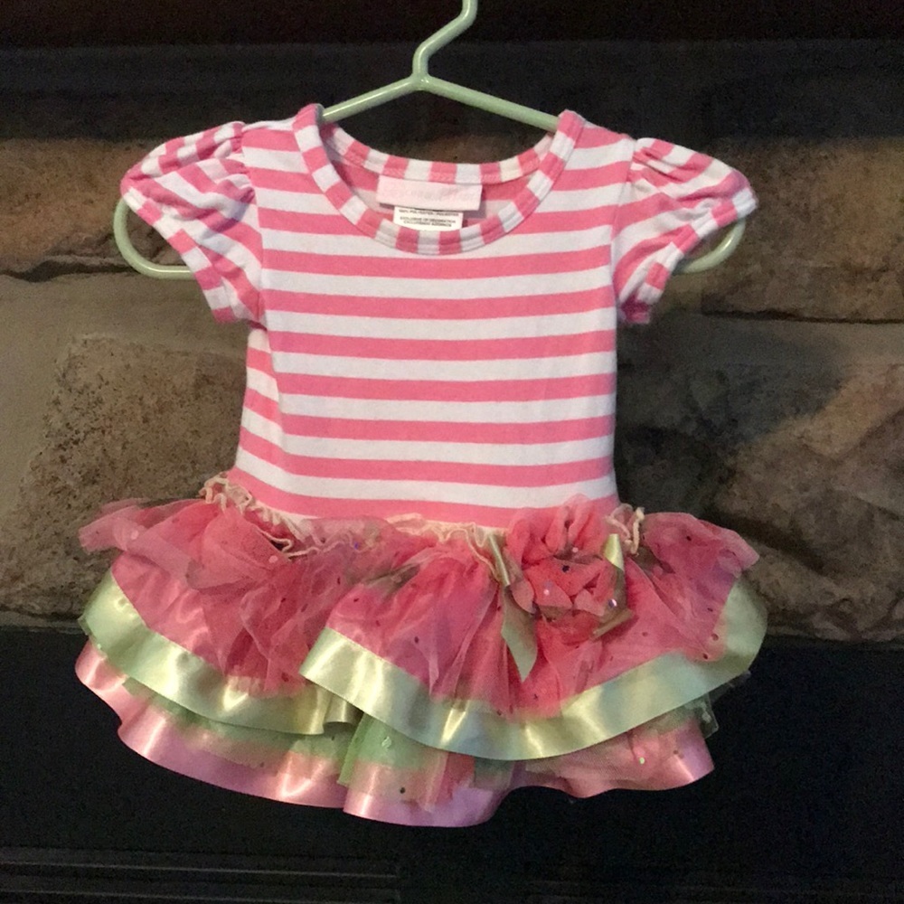 Pink stripe dress with tutu skirt.